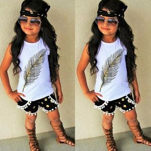 Feather top and polka dot shorts outfit